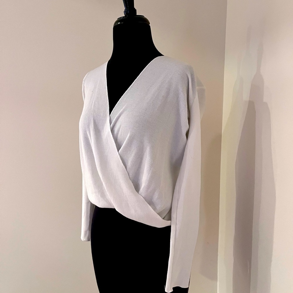 Soft thermal Project Social T from Urban Outfitters. Stylish crossed front.